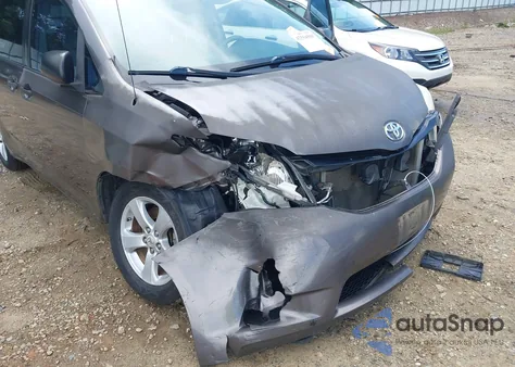 2011 Toyota Sienna Base V6 z USA, uszkodzony, nr VIN 5TDZK3DC7BS004067